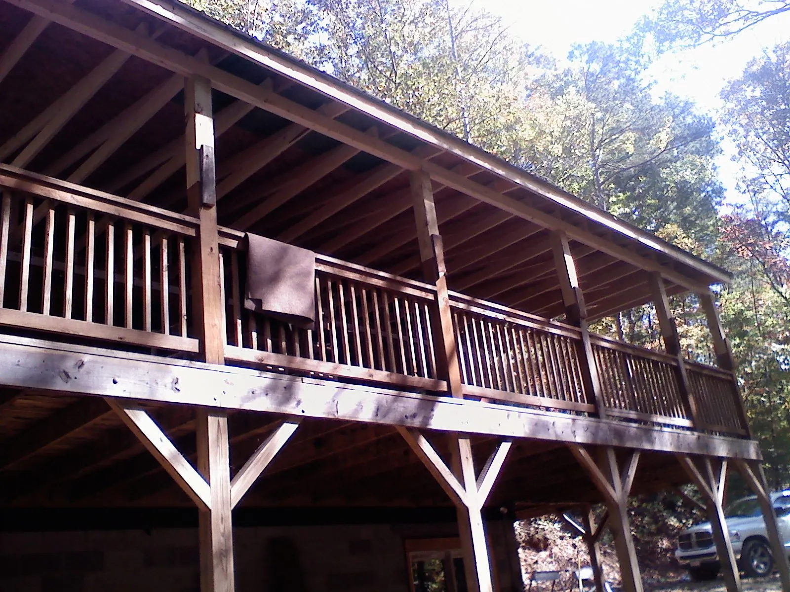 Timber framing under a new elevated porch and deck — Roof Leak Repair in Barnhart by Roofing Brothers